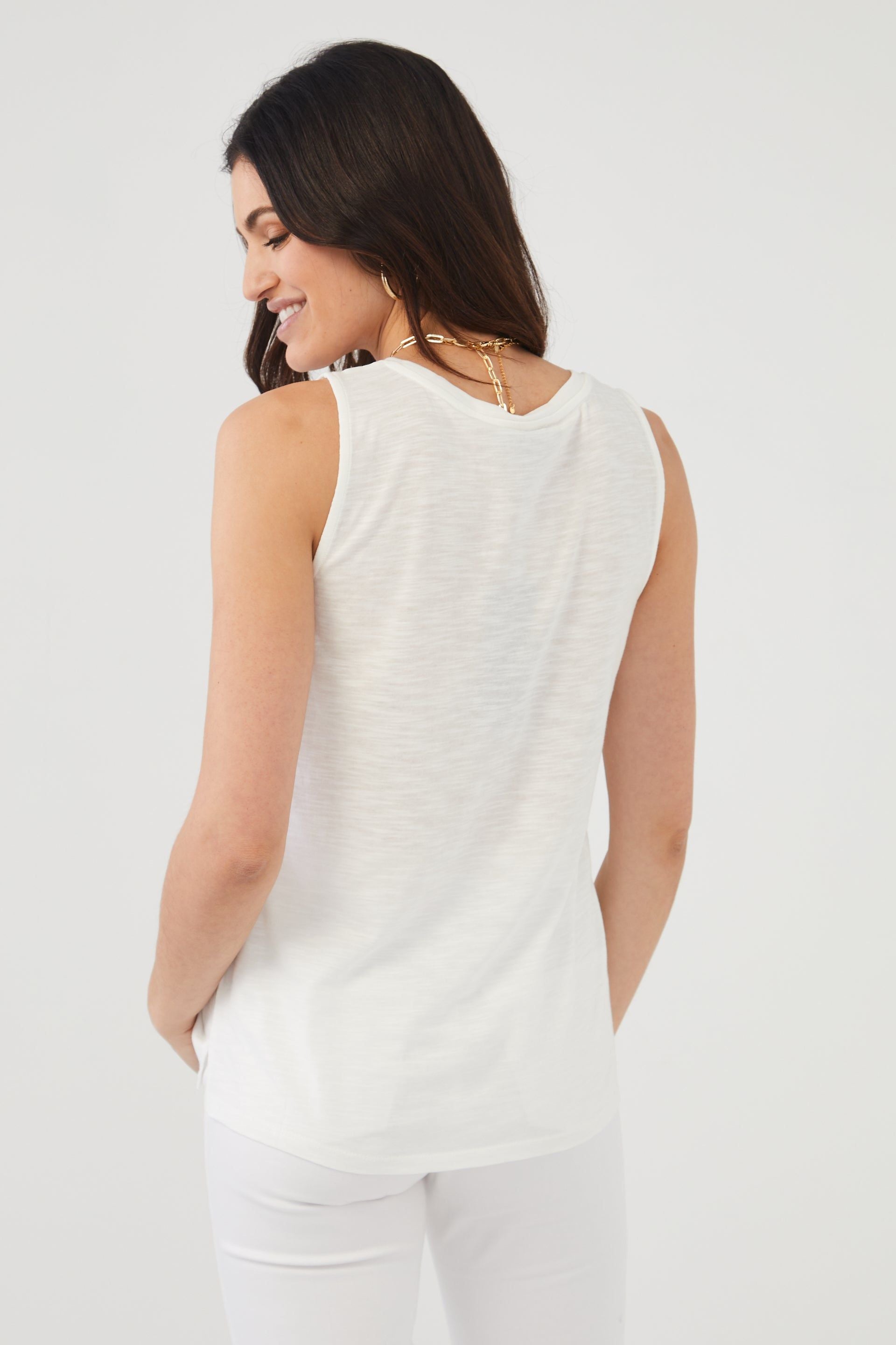 White sleeveless tank store top